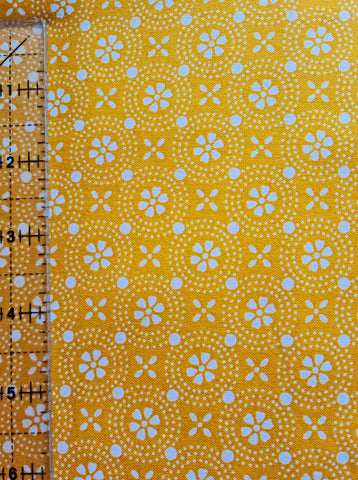 Dotted Circles gold cotton fabric