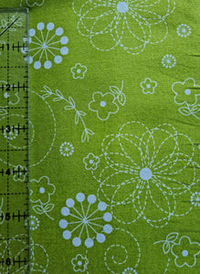 Doodles green cotton fabric