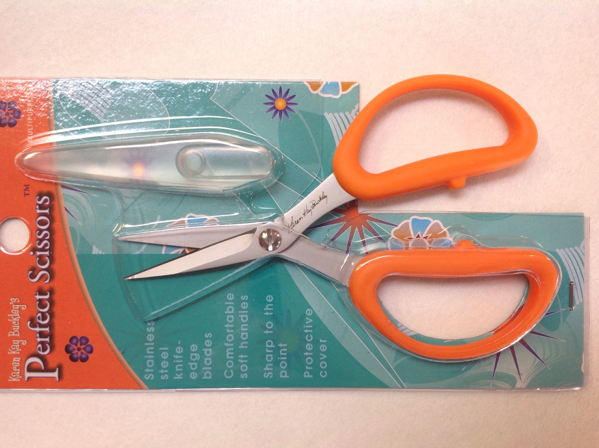 Karen kay Buckley' - perfect scissors, orange